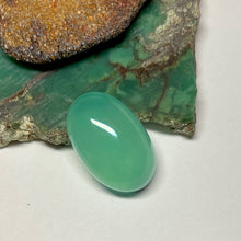  This natural 4.2ct cabochon of chrysoprase was mined in Queensland Australia. The piece is pale apple green with great luminosity.