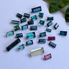 This parcel of 29 pieces of natural unheated tourmaline ranges from green to darker teal to lighter blue/teal, also pink and champagne. They are all eye clean and assorted similar size and shape, not all exactly alike.