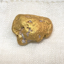  An absolutely stunning 51.85gr gold nugget was found by a metal detectorist and dug by hand in Clermont, Queensland, Australia. This is a rare find.  Approx. 96% pure gold, with possible quartz inclusion.