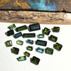 This parcel of 22 pieces of natural unheated tourmaline ranges from mid green to darker green. They are all eye clean and assorted size baguette cut.