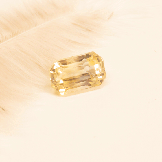 pale yellow faceted sapphire, pretty clean stone