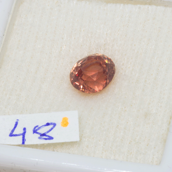 Oval cut 1.18ct, clean dark pink peach  faceted stone
