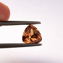 This light orange zircon has a hint of peach to its tone and is both eye and loupe clean. This piece is unheated and was responsibly sourced from Madagascar.