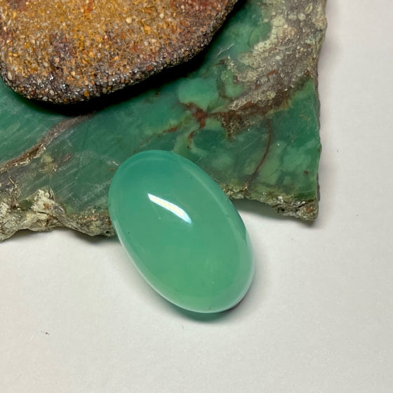 This natural 4.2ct cabochon of chrysoprase was mined in Queensland Australia. The piece is pale apple green with great luminosity.