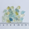 These parcels are a mix of natural, unheated aquamarine, helidor, green beryl and goshenite from Nigeria. This material has moderate inclusions, but is very gemmy material and a great choice for anyone looking to get into gem cutting!