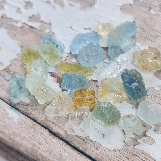 These parcels are a mix of natural, unheated aquamarine, helidor, green beryl and goshenite from Nigeria. This material has moderate inclusions, but is very gemmy material and a great choice for anyone looking to get into gem cutting!