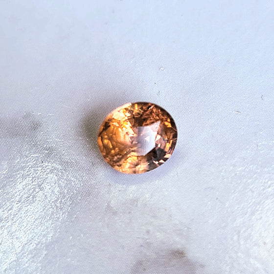 1.00ct Peach Orange Unheated Oval Sapphire