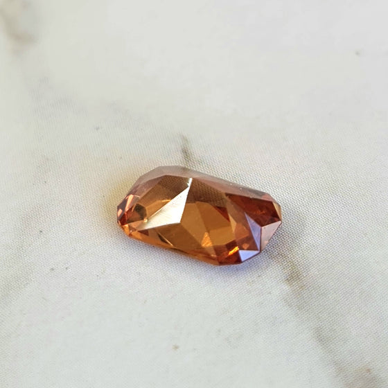 1.30ct Emerald Cut Spessartite Garnet