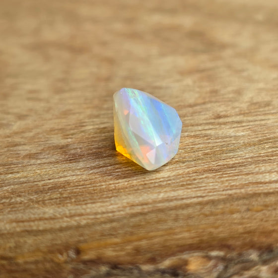 1.29ct Trilliant Cut Faceted Australian Opal