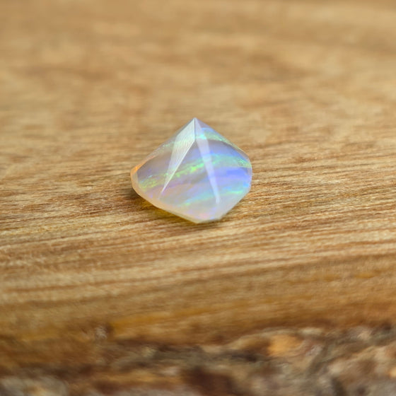 1.29ct Trilliant Cut Faceted Australian Opal