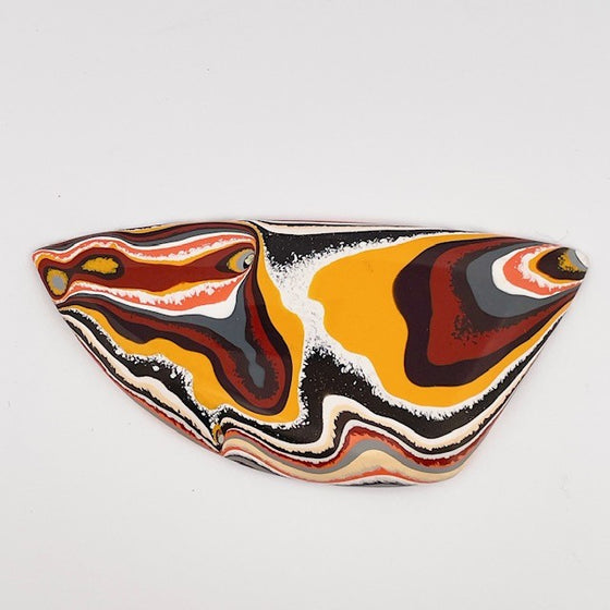 This great piece of original fordite was salvaged from former Ford factory in Detroit. The piece is in fantastic 70's colours, great for funky jewellery.