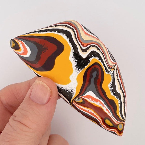 This great piece of original fordite was salvaged from former Ford factory in Detroit. The piece is in fantastic 70's colours, great for funky jewellery.