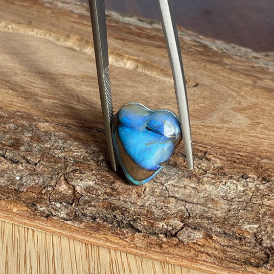 9.40ct Heart Shape Boulder Opal, this heart has bright blue and green on both sides and on the edges with very interesting patterns.