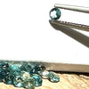 This parcel of 27 round cuts of natural unheated tourmaline ranges from light green to pale teal blue.&nbsp; They are all eye clean. The depth varies.