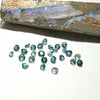 This parcel of 27 round cuts of natural unheated tourmaline ranges from light green to pale teal blue.&nbsp; They are all eye clean. The depth varies.