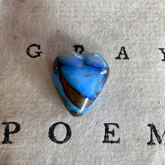 9.40ct Heart Shape Boulder Opal, this heart has bright blue and green on both sides and on the edges with very interesting patterns.