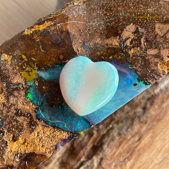 3.10ct Heart Shape Crystal Opal8.40ct Freeform Boulder Opal. A very pretty well shaped heart with a streak of pink running through the centre and apple green on the sides. 
