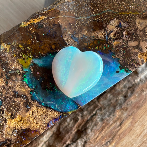 3.10ct Heart Shape Crystal Opal8.40ct Freeform Boulder Opal. A very pretty well shaped heart with a streak of pink running through the centre and apple green on the sides. 