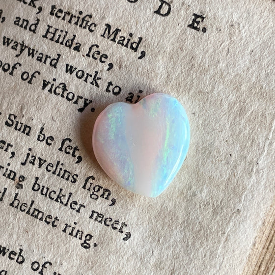 3.10ct Heart Shape Crystal Opal8.40ct Freeform Boulder Opal. A very pretty well shaped heart with a streak of pink running through the centre and apple green on the sides. 