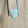 4.35ct Heart Shape Crystal Opal, this piece shows green, pink and gold running diagonally across the heart. A really stunning stone.