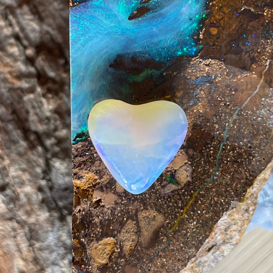 3.40ct Heart Shape Crystal Opal. This small heart has an overall clear golden blue colour, very soft and pretty.