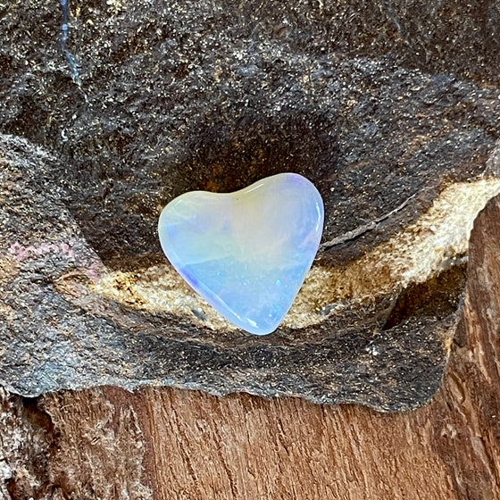 3.40ct Heart Shape Crystal Opal. This small heart has an overall clear golden blue colour, very soft and pretty.