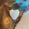 3ct Heart Shape Crystal Opal, this heart shaped opal has a great flash of bright green on one side, with more green and purple sparkle through it.