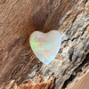 3ct Heart Shape Crystal Opal, this heart shaped opal has a great flash of bright green on one side, with more green and purple sparkle through it.