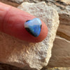 5ct Heart Shape Boulder Opal, this tiny heart is clear misty blue across the top with a slightly darker blue at the base. The cutter has used the patterns in the opal to enhance the piece.