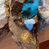 5ct Heart Shape Boulder Opal, this tiny heart is clear misty blue across the top with a slightly darker blue at the base. The cutter has used the patterns in the opal to enhance the piece.