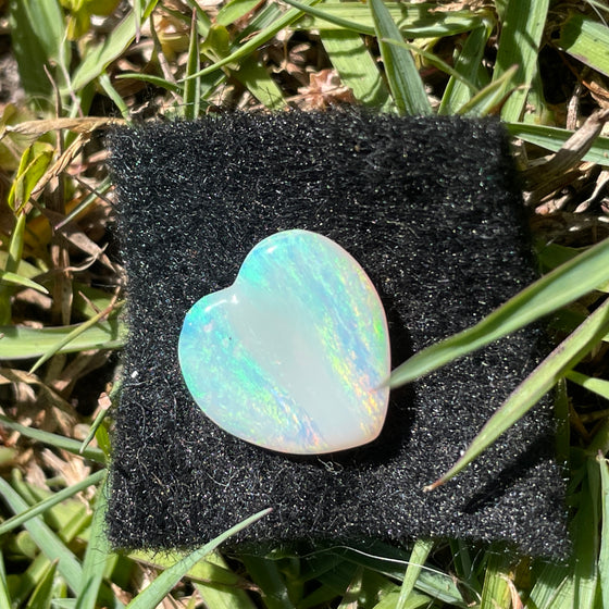 3.10ct Heart Shape Crystal Opal8.40ct Freeform Boulder Opal. A very pretty well shaped heart with a streak of pink running through the centre and apple green on the sides. 