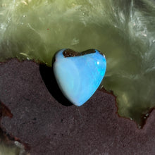  7.35ct Heart Shape Boulder Opal with clear blue green softly swirling patterns on the surface, the colour goes around the side as well. 