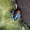 8.75ct Heart Shape Boulder Opal, this heart has swirling patterns of dark blue, light blue gold and brown, the colour is also on the sides making it a perfect pendant piece.