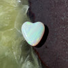 4.35ct Heart Shape Crystal Opal, this piece shows green, pink and gold running diagonally across the heart. A really stunning stone.