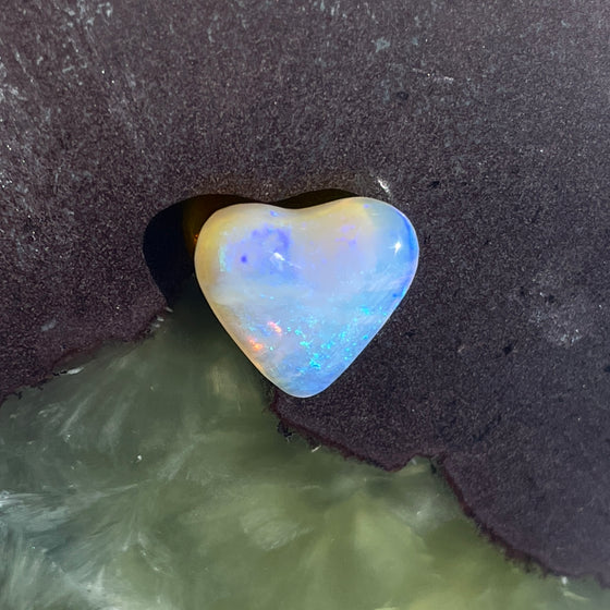 3.40ct Heart Shape Crystal Opal. This small heart has an overall clear golden blue colour, very soft and pretty.