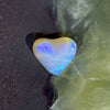3.40ct Heart Shape Crystal Opal. This small heart has an overall clear golden blue colour, very soft and pretty.