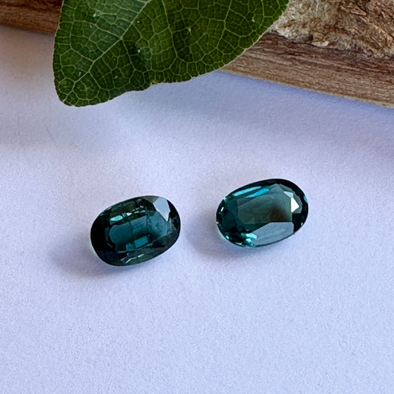 This parcel of 2 oval cut natural unheated tourmaline are a rich dark teal blue.  They are eye clean. The stones are very slightly different in colour and shape. Responsibly sourced.