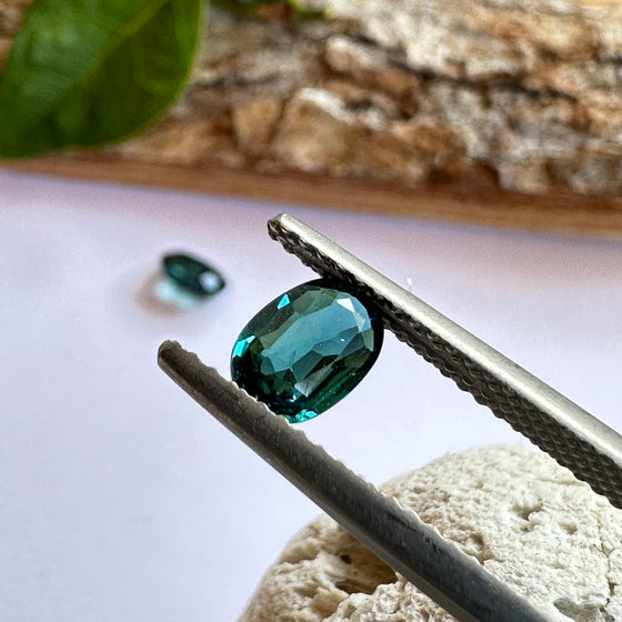 This parcel of 2 oval cut natural unheated tourmaline are a rich dark teal blue.  They are eye clean. The stones are very slightly different in colour and shape. Responsibly sourced.