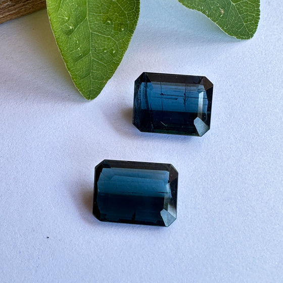 This parcel of 2 natural unheated tourmaline are mid to dark blue/teal, one stone is slightly darker than the other.  They are close but not exactly the same size and shape as one stone has a longer keel.