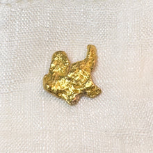  This interesting 9.784gr gold nugget was found by a metal detectorist and dug by hand in Clermont, Queensland, Australia.  Approx. 96% pure gold, with possible quartz inclusion.