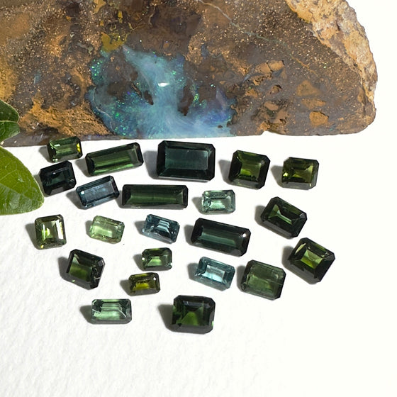 This parcel of 22 pieces of natural unheated tourmaline ranges from mid green to darker green. They are all eye clean and assorted size baguette cut.