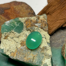  This natural 4.2ct cabochon of chrysoprase was mined in Queensland Australia. The piece is pale apple green with great luminosity.