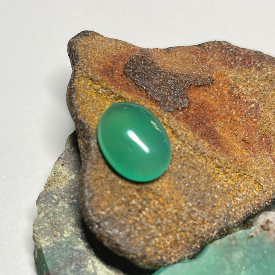 This natural 4.2ct cabochon of chrysoprase was mined in Queensland Australia. The piece is pale apple green with great luminosity.