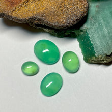  These natural chrysoprase cabochons were mined in Queensland Australia. The larger pieces are a beautiful and consistent mid luminous blue green, the two smaller have a more apple green shade. 