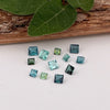 This parcel of 12 tiny natural unheated tourmaline are mostly pale green and blue. They are all eye clean and are assorted sizes between 2-3mm