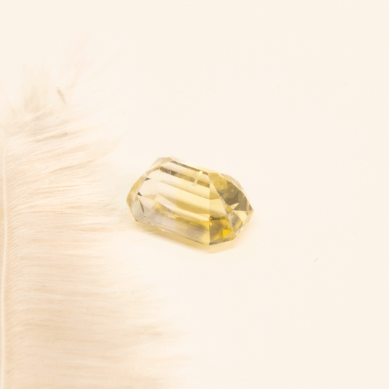 pale yellow faceted sapphire, pretty clean stone