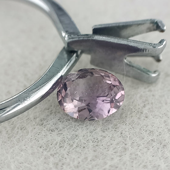 0.59ct Purple Sapphire Oval Cut
