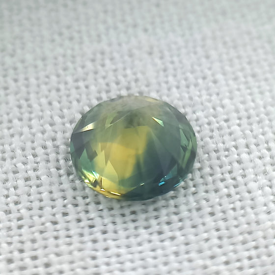 0.87ct Australian Parti Sapphire Round Cut