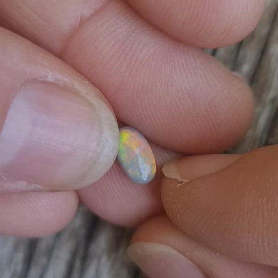 0.67ct Oval Cut Semi-Black Opal Cabochon