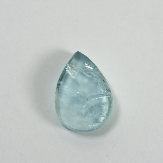 5.67ct Bespoke Pear Shape Rough Cut Aquamarine, modern aquamarine gemstone in pale sea green, sparkling pale blue beauty, bespoke cutting, responsible sourcing in Mozambique, rough aquamarine with bespoke polishing